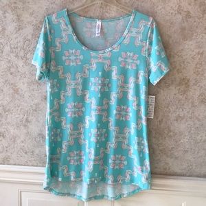NWT LulaRoe Classic T Size Small. Light turquoise and pink.